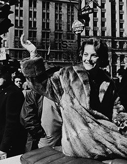 Carol Heiss waves to the crowd at the ticker tape parade.