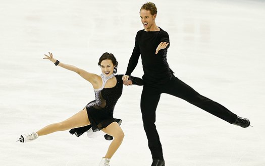 MAdison Chock and Evan Bates perform a spin element at the 2015 World Championships.