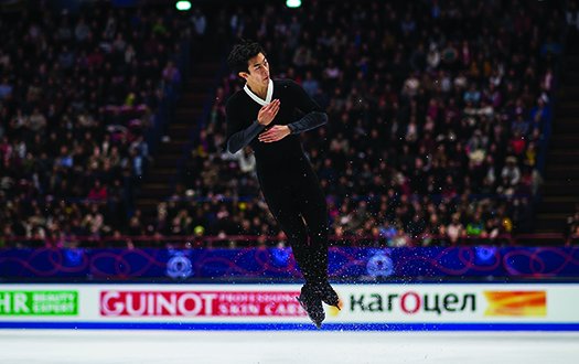 Nathan Chen completes a quad jump at the 2018 World Championships