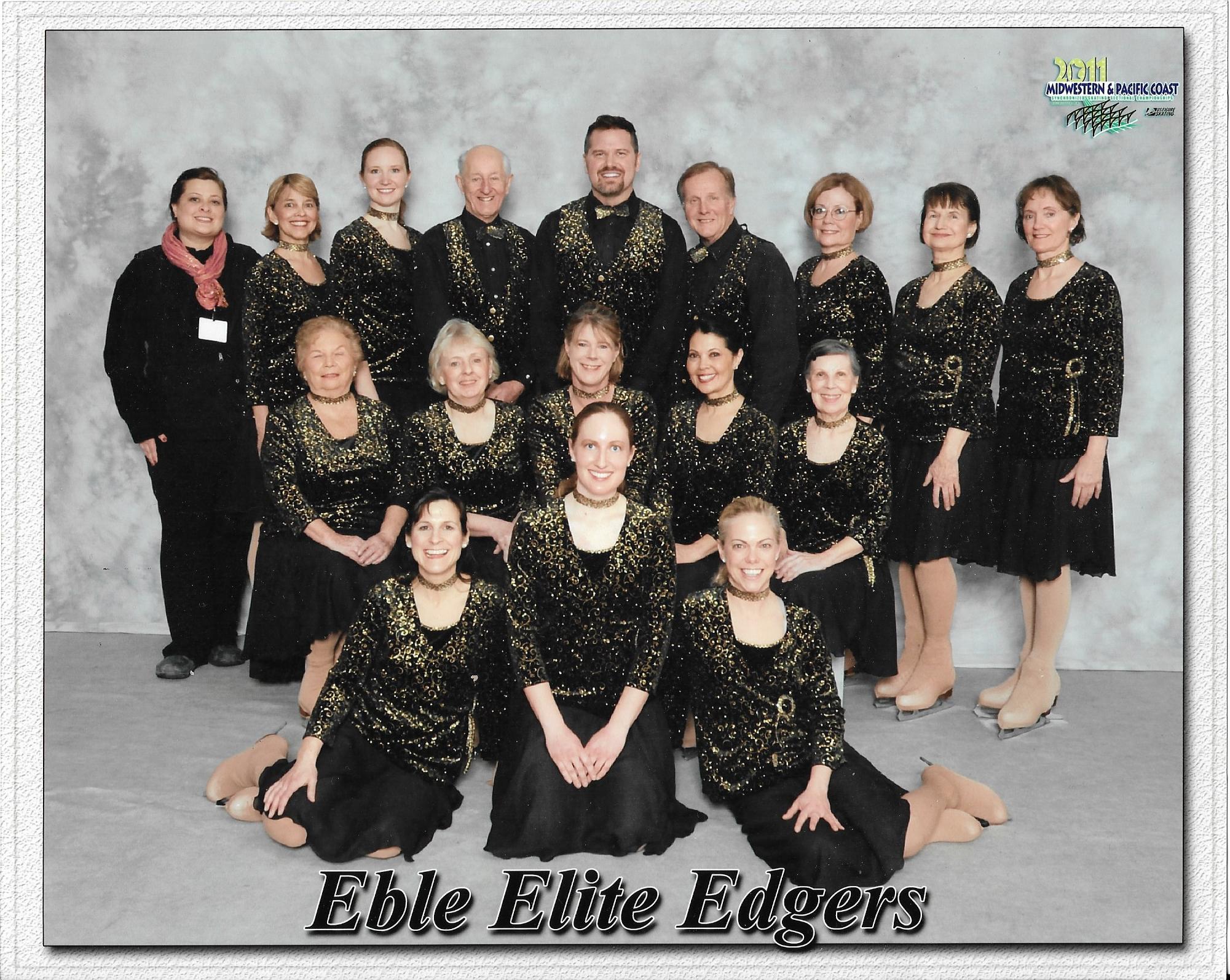 An old team photo of the Eble Elite Edgers wearing black costumes.