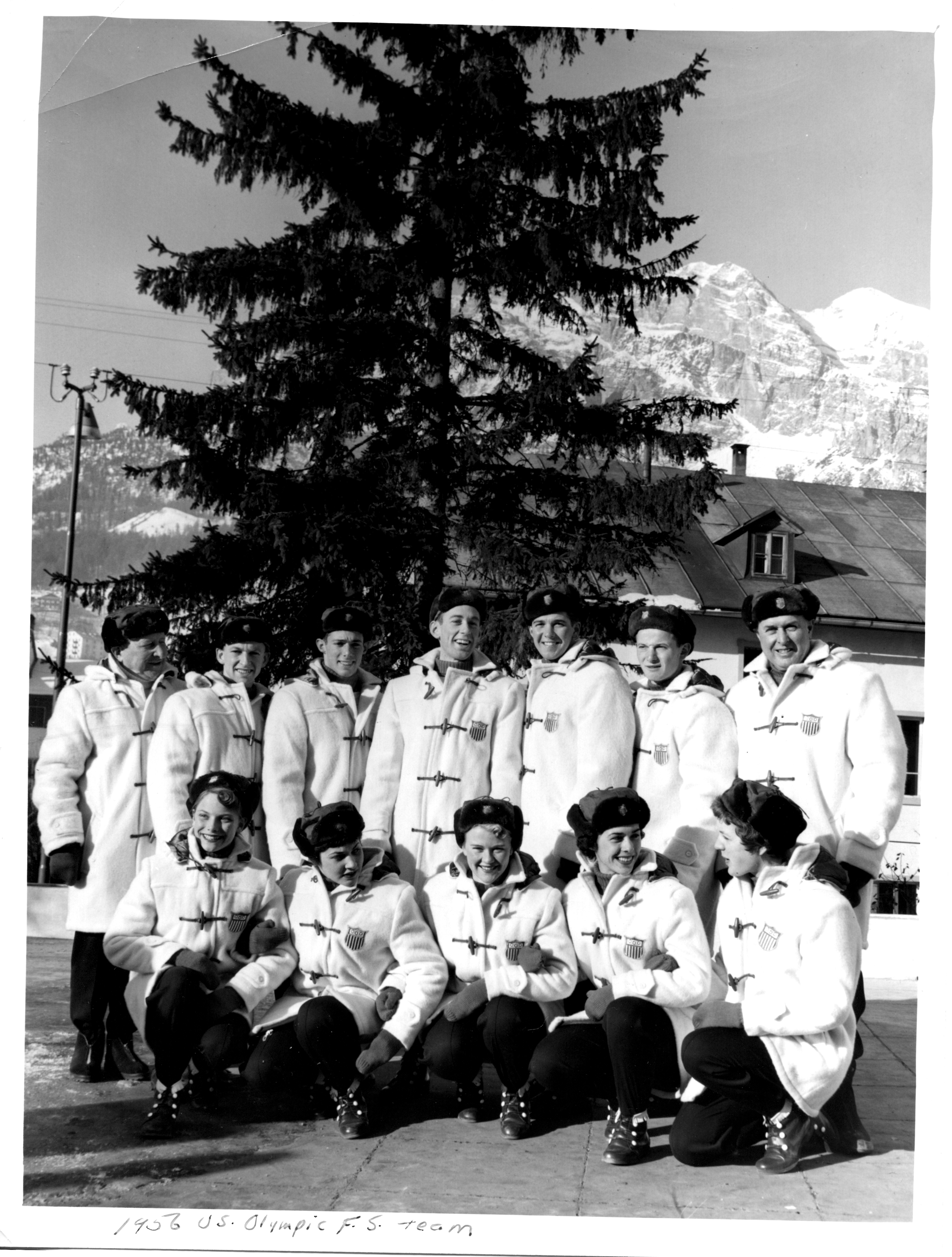 1956 U.S. Olympic Figure Skating Team poses for a group photo in the mountains