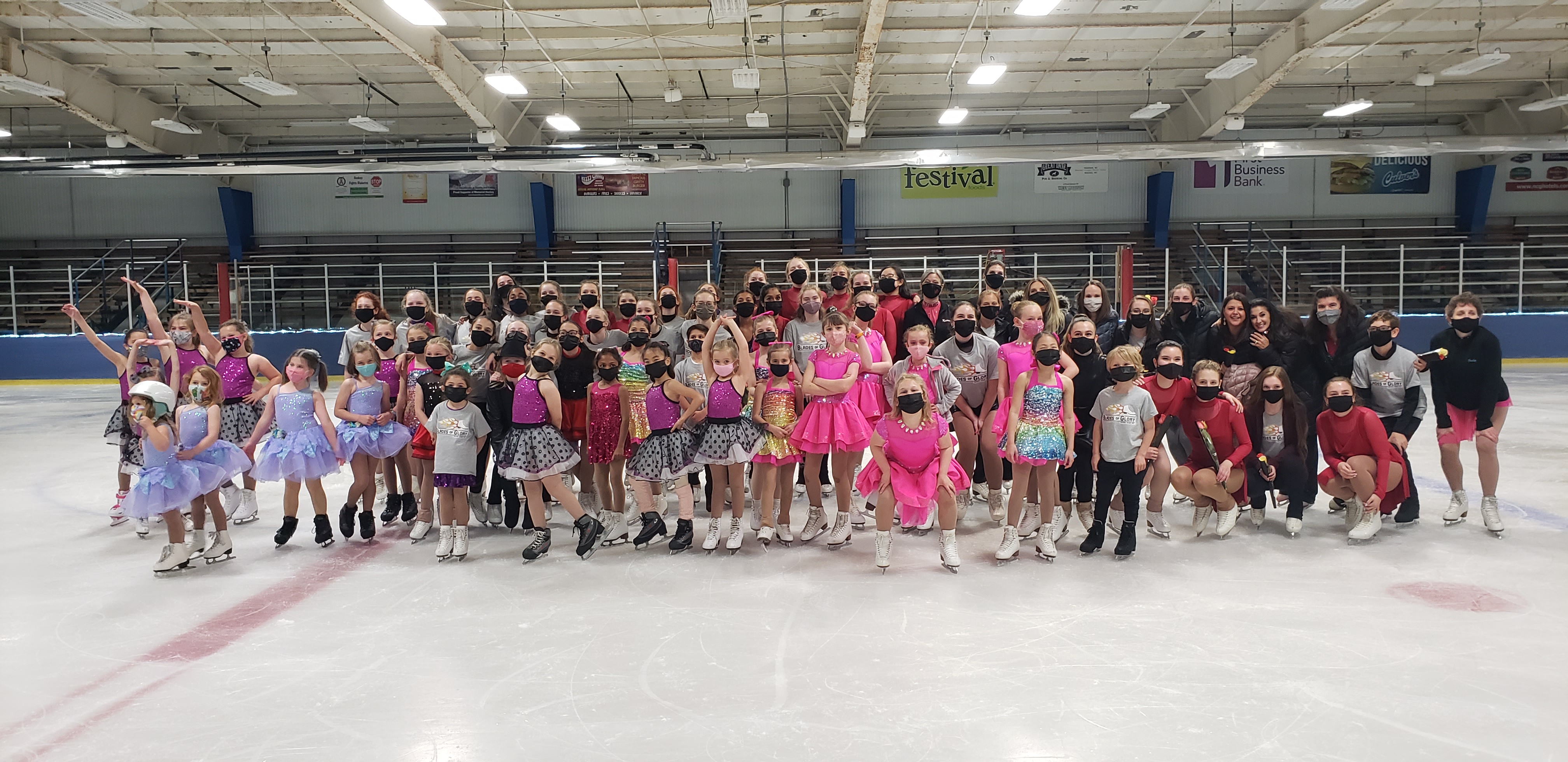 A group of shot of FSC Of Madison skaters on the ice