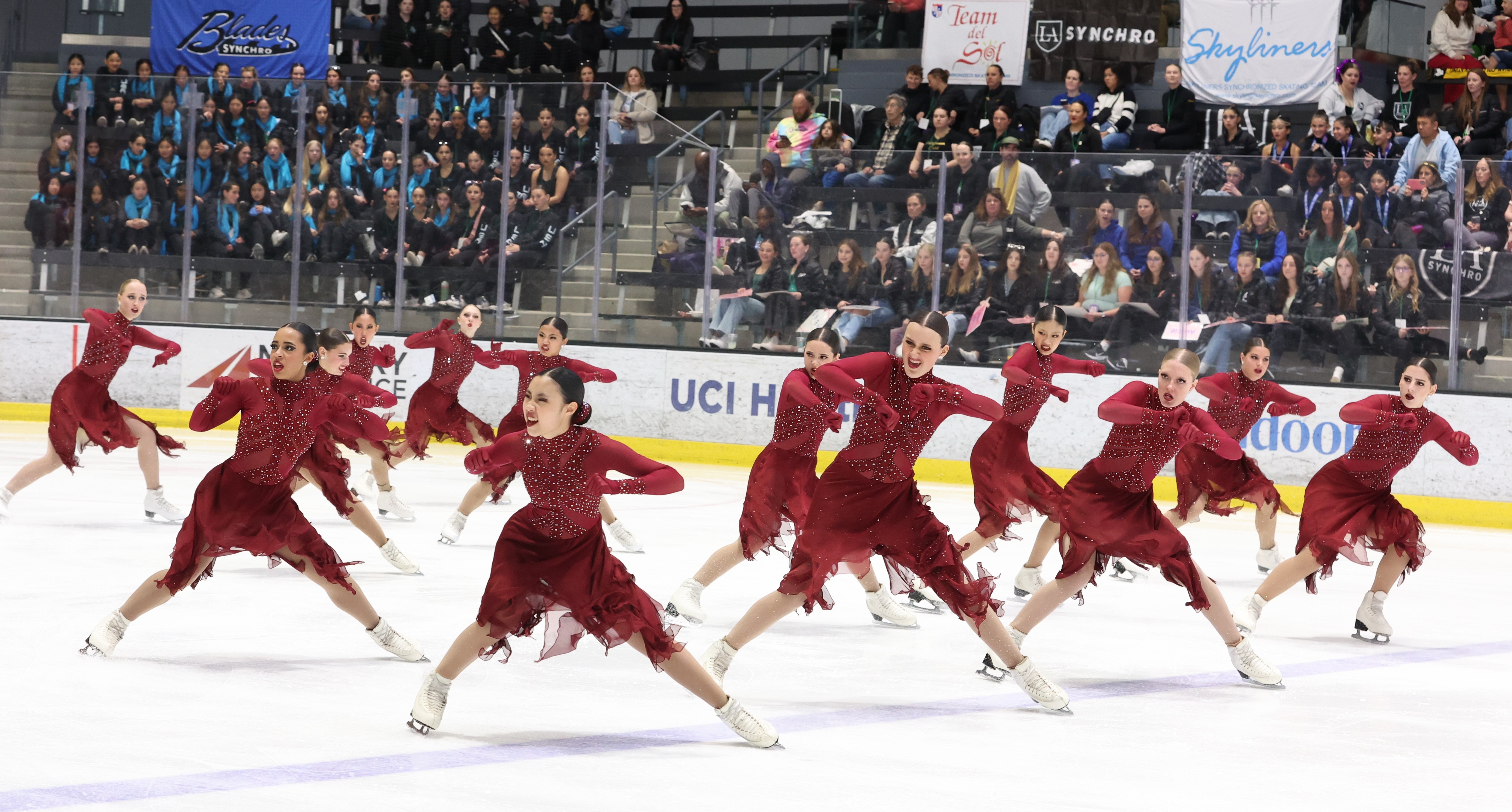 Dressed in red, Teams Elite junior delivers a fiery program with emotion.