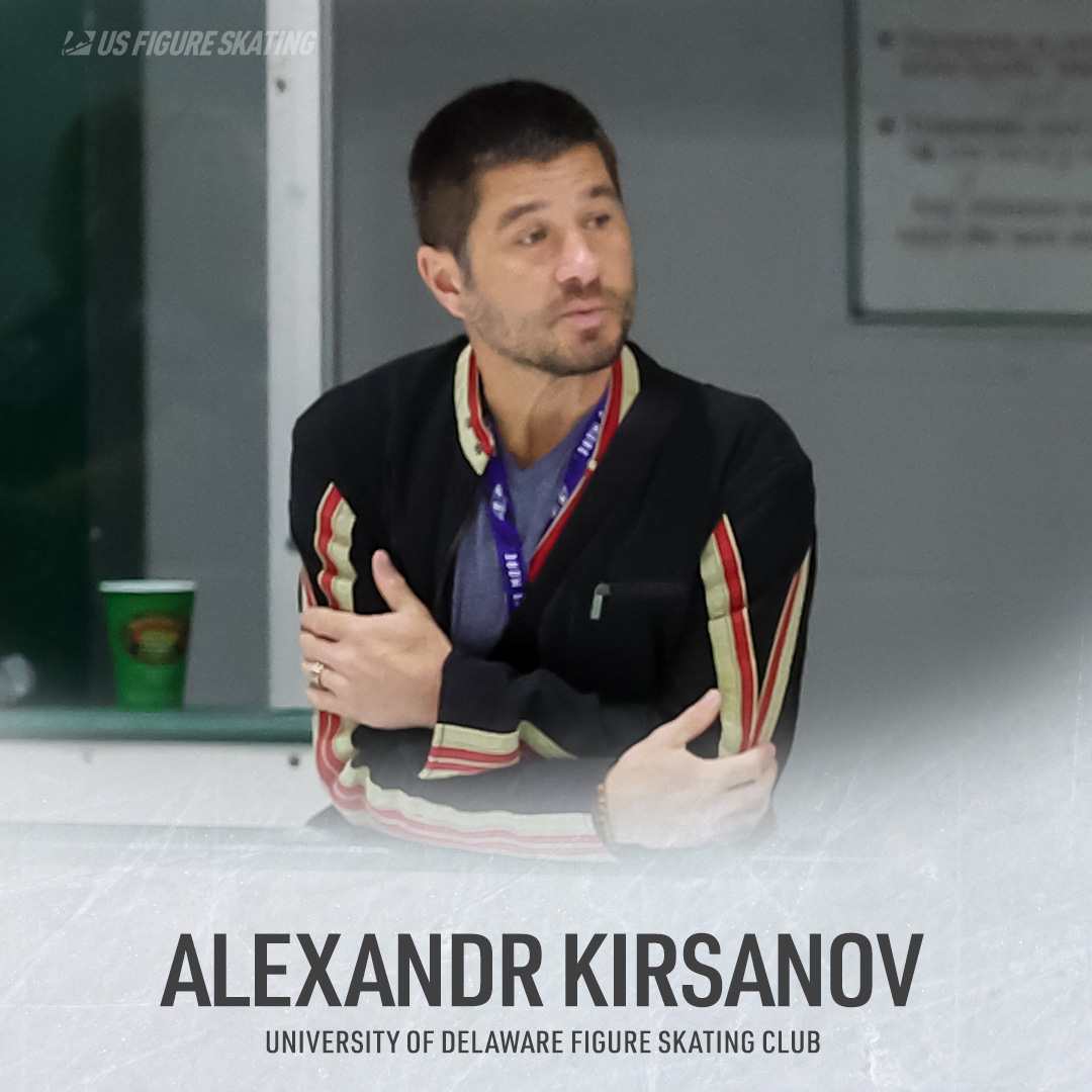 Photo of Alexandr Kirsanov looking over the boards. Below him is his name and the text "University of Delaware Figure Skating Club"