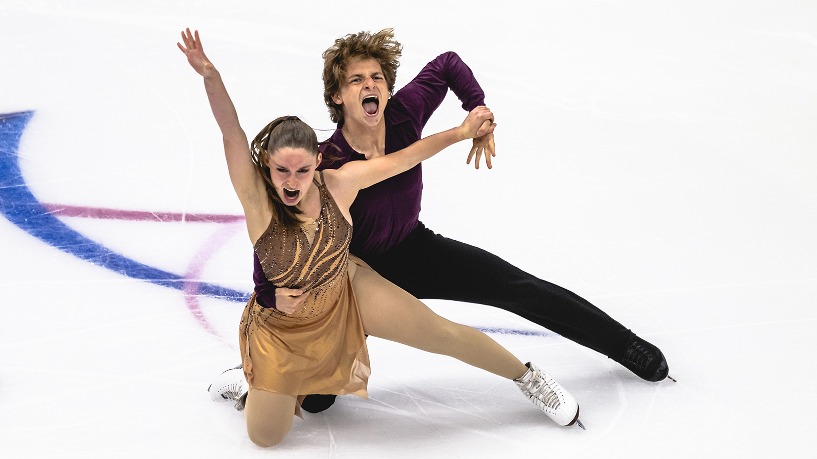 Each down on a knee, Oona Brown wearing brown and Gage Brown wearing black, show their raw emotion to their James Brown rhythm dance.