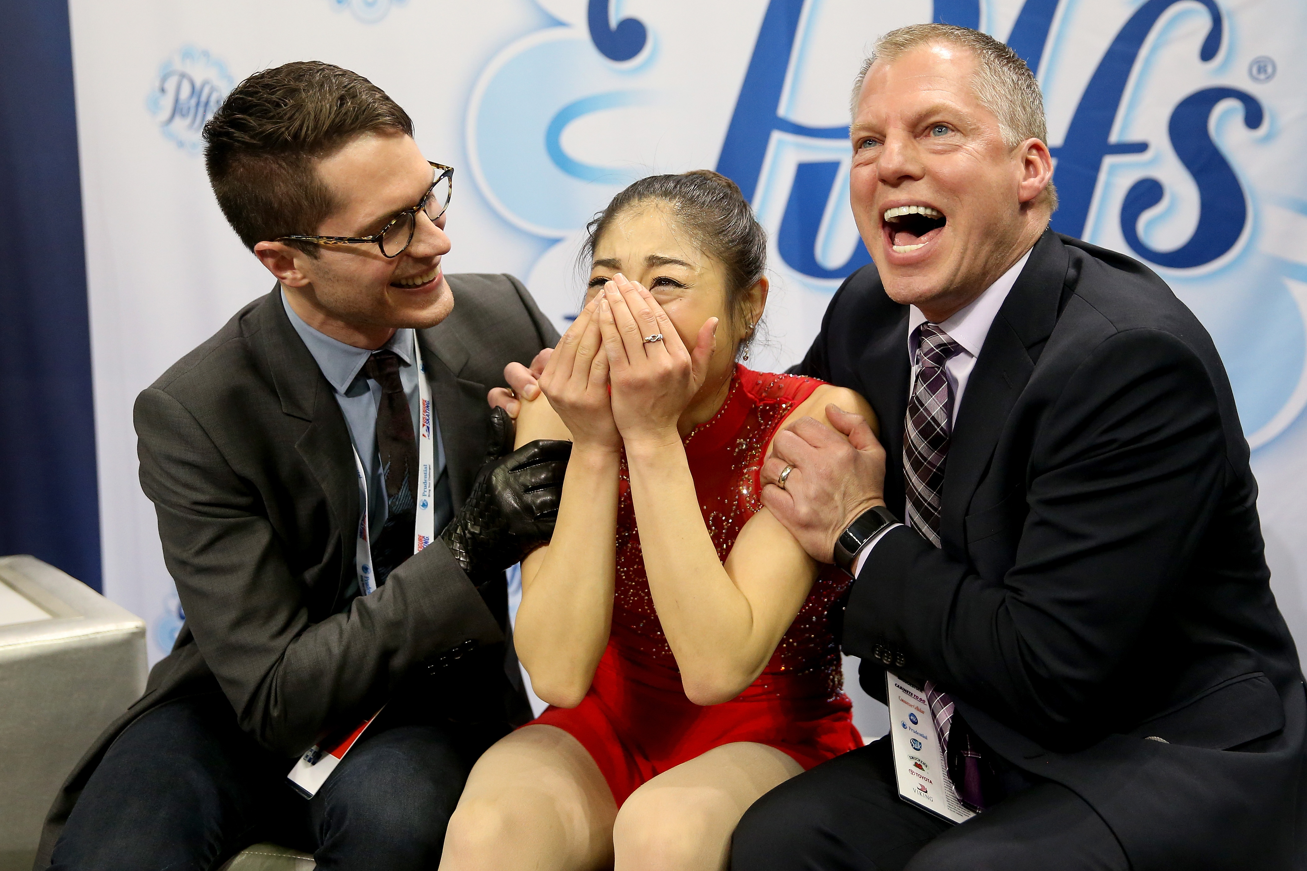 Mirai Nagasu celebrates in the kiss and cry with coaches Drew Meekins and Tom Zakrajsek after skating in the Ladies Free Skate during the 2018 Prudential U.S. Figure Skating Championships at the SAP Center on January 5, 2018 in San Jose, California.