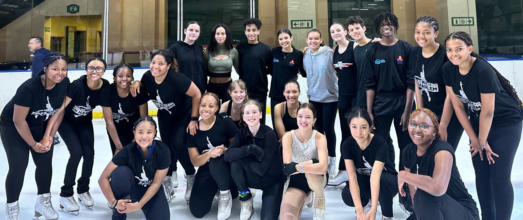 Group photo on the ice of Figure Skating in Harlem and competitive skaters from a local rink. 