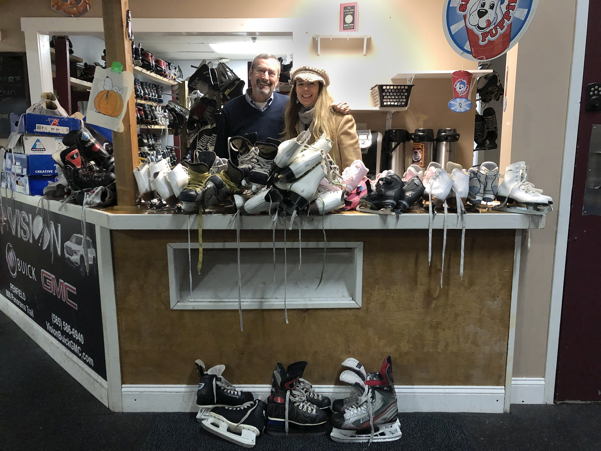 Coach Pam Bossar is happy to show the many pairs of skates rented for Open House day.