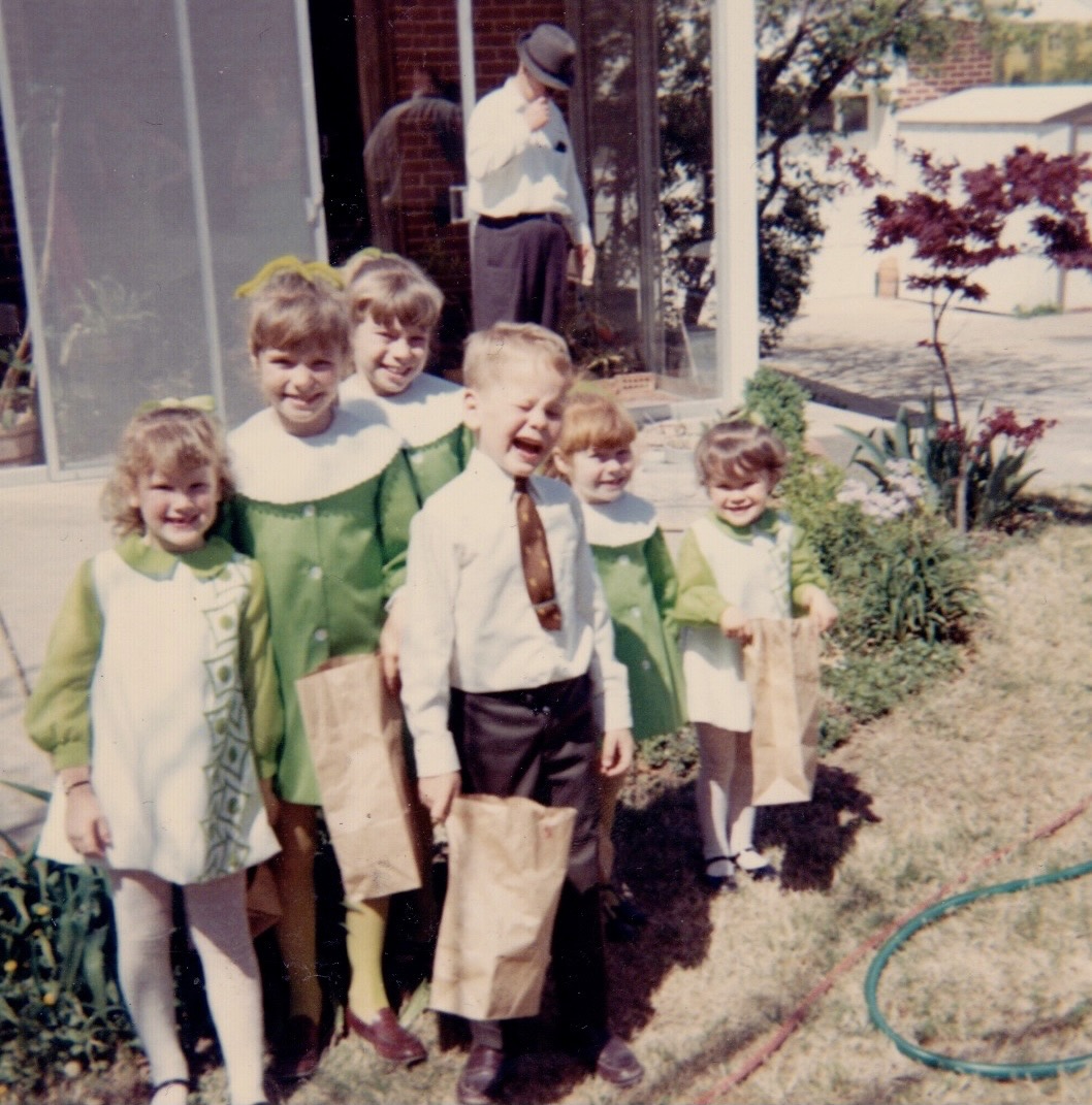 The Graham and Reed siblings prepare for an Easter egg hunt.