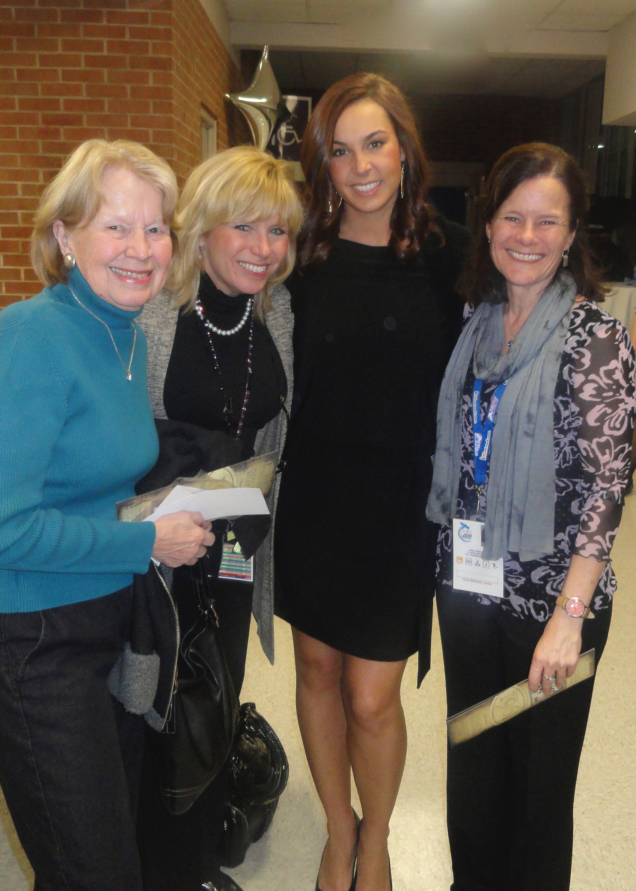 Four generations of the Graham family reunite at a skating event (l-r) Beth Graham, Lorrie Reed and her daughter Kelsey Gislason, and Beth’s daughter, Dana.