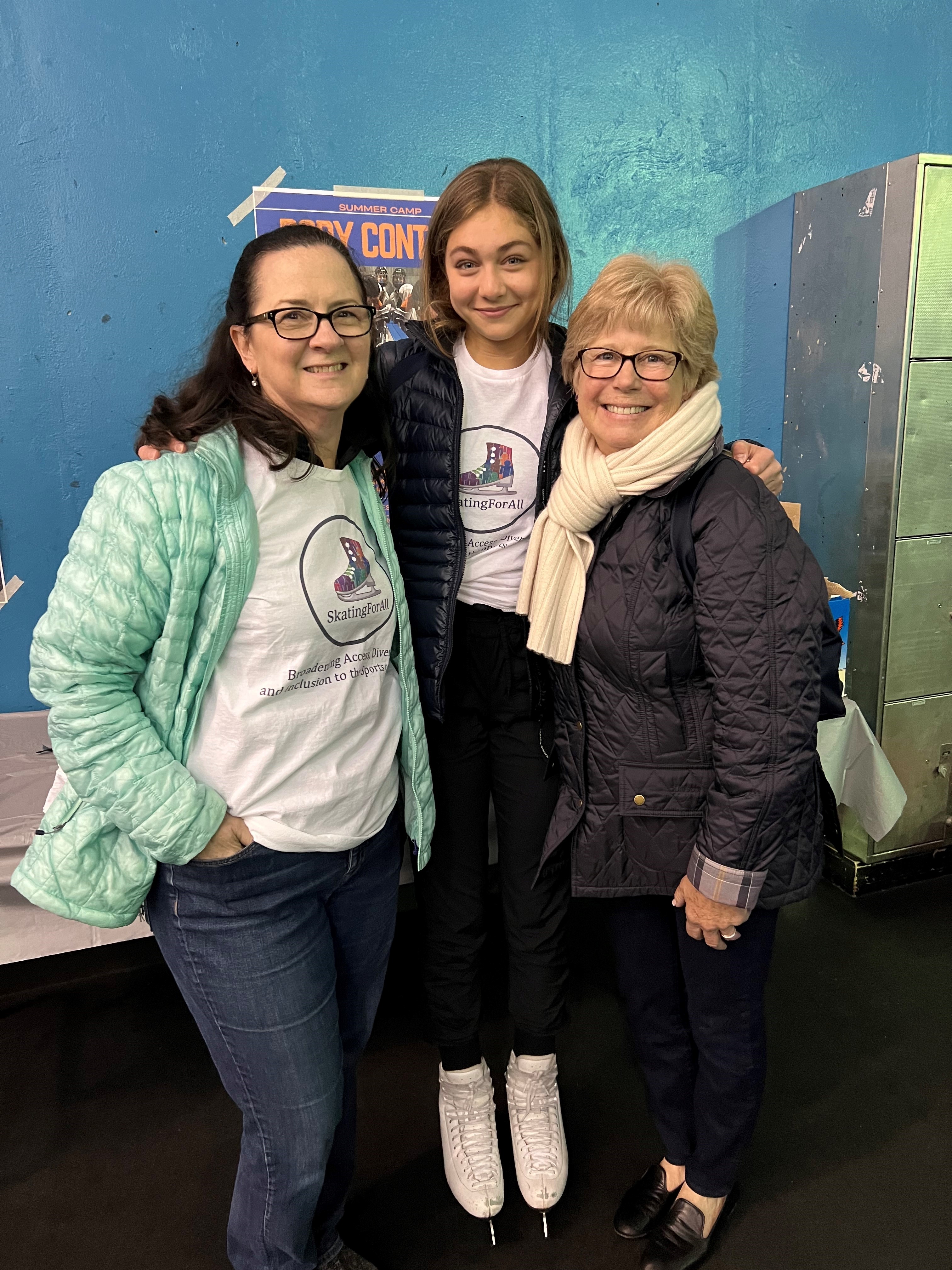 President of the Skating Club of Morris Moira Colquhoun, Antonia Galdi and coach Kathy Bird