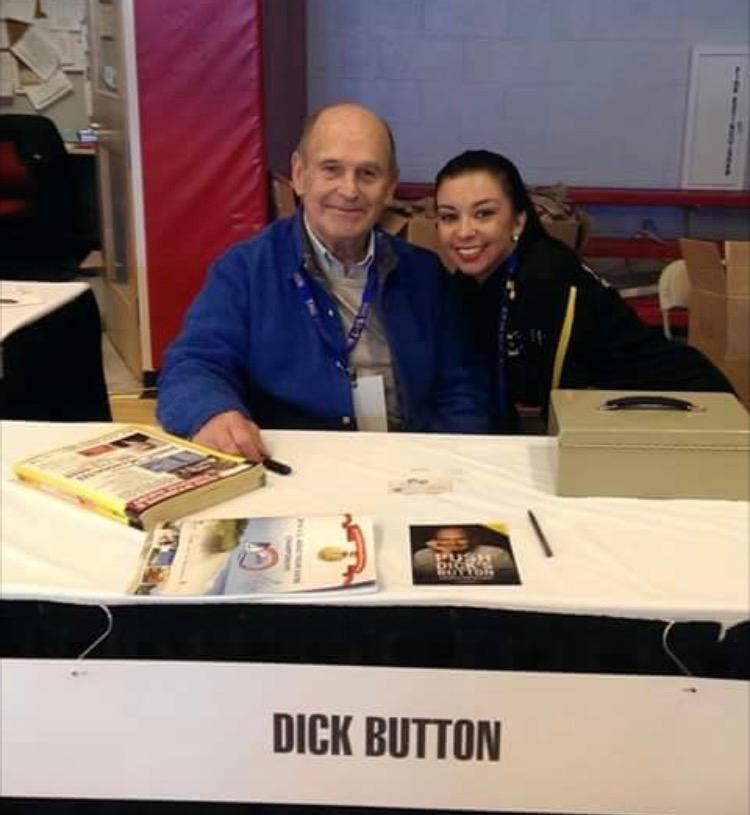 Rachel Duran poses with skating legend Dick Button.