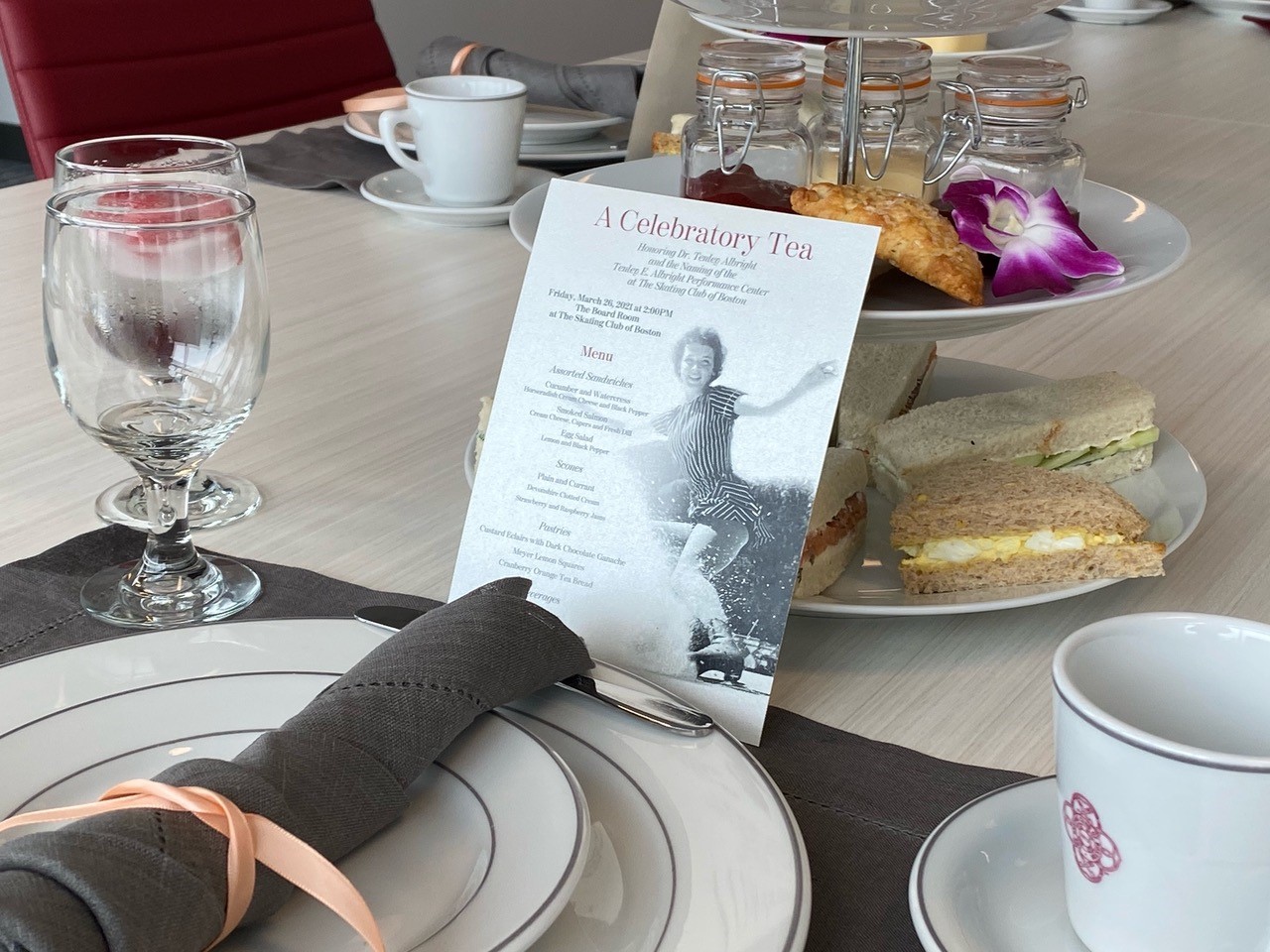 The program and table set up for the reception celebrating Dr. Tenley Albright.