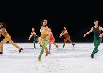 Five skaters perform together, wearing different colors of the four seasons. 