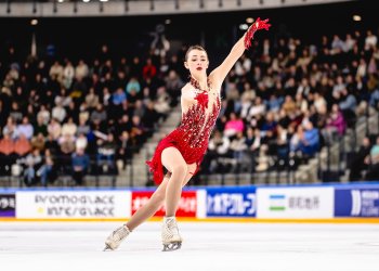  Dressed in all red, Sarah Everhardt performs her "Firebird" routine.